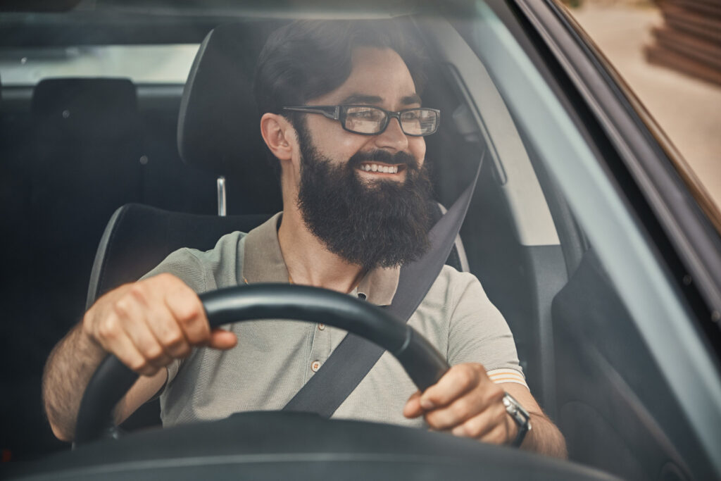 modern bearded man driving car 1